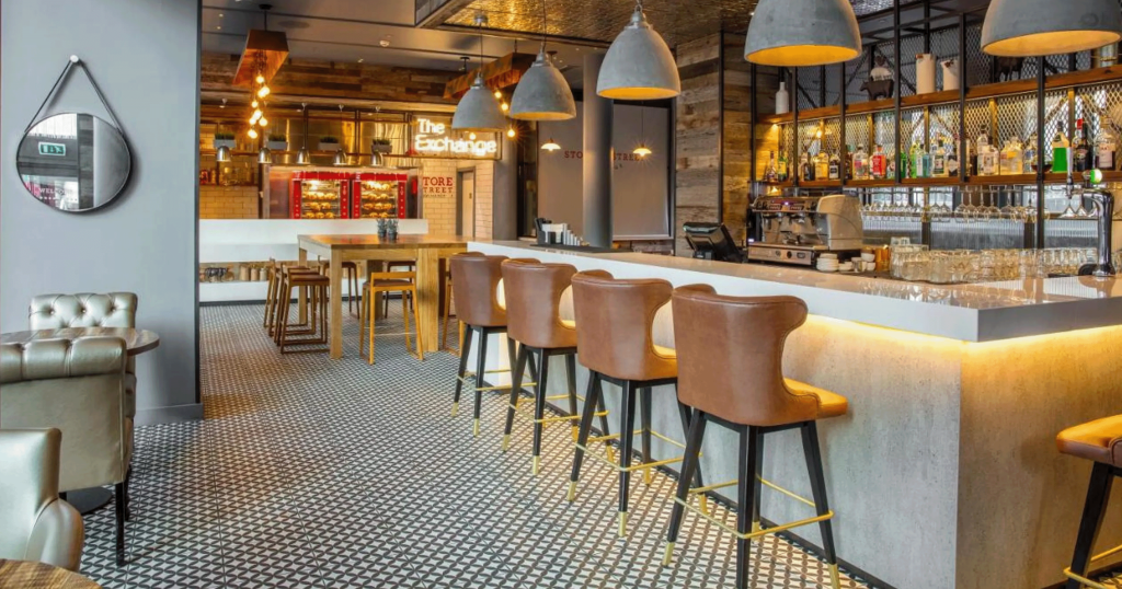 The bar area at Double Tree Hilton Hotel Piccadilly in Manchester showing modern decor.